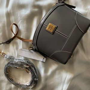 This Dooney and Bourke is a mini Steel grey, mini purse